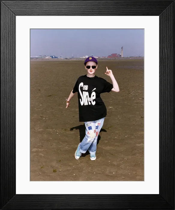 Framed Print : Bronagh Gallagher Actress in the film The Commitments standing on beach in black t shirt