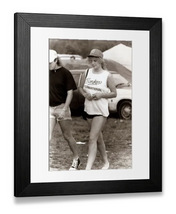 Framed Print : Music Festivals - Pop and Jazz Festival woman wearing a T shirt with the words Framed Print : Music Festivals - Pop and Jazz Festival woman wearing a T shirt with the words