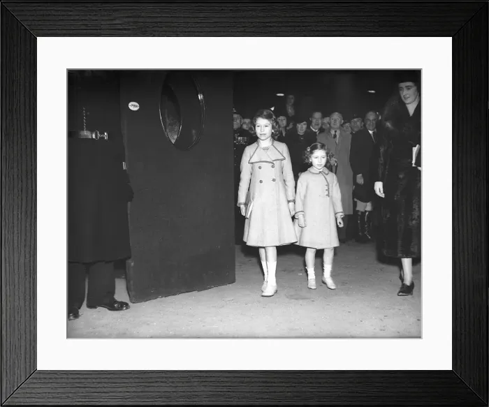 Framed Print : Princess Elizabeth and her sister Princess Margaret arrive at the theatre, circa 1940 Framed Print : Princess Elizabeth and her sister Princess Margaret arrive at the theatre, circa 1940