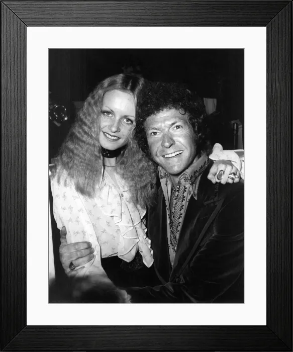 Framed Print : Twiggy, real name Lesley Hornby, with singer Joseph Ward at a reception at the Ritz Hotel Framed Print : Twiggy, real name Lesley Hornby, with singer Joseph Ward at a reception at the Ritz Hotel