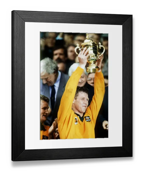 Framed Print : Austalian rugby captain Nick Farr-Jones holding aloft the Rugby Union World Cup Framed Print : Austalian rugby captain Nick Farr-Jones holding aloft the Rugby Union World Cup