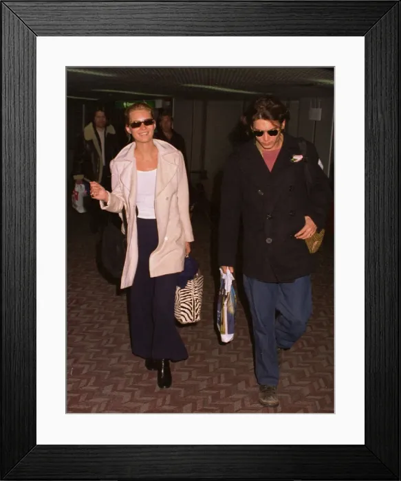 Framed Print : Kate Moss Model arrives at Heathrow Airport with her boyfriend Johnny Depp Actor Framed Print : Kate Moss Model arrives at Heathrow Airport with her boyfriend Johnny Depp Actor
