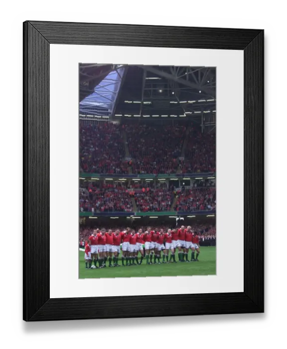 Framed Print : Welsh rugby team singing the National Anthem before the match against Argentina in