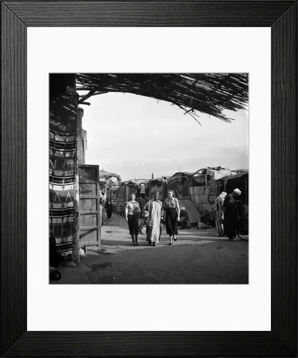 Framed Print : Actor Jeff Hunter on location with the Castand Crew of the film Framed Print : Actor Jeff Hunter on location with the Castand Crew of the film