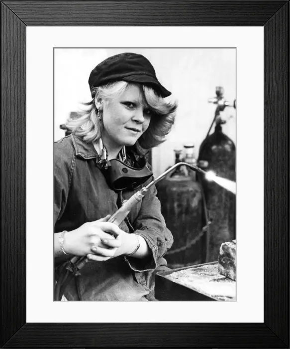 Framed Print : Striking a blow for womens lib is trainee welder Michelle Leach Framed Print : Striking a blow for womens lib is trainee welder Michelle Leach