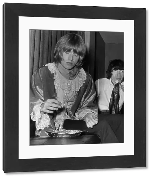 Rolling stones: Brian Jones and Bill Wyman 19th May 1967 grab a bite to eat