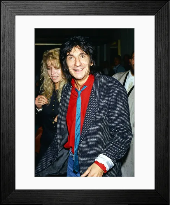 Framed Print : Ronnie Wood - October 1987 with wife Jo, at the premiere of Framed Print : Ronnie Wood - October 1987 with wife Jo, at the premiere of
