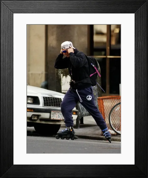 Framed Print : John F Kennedy Jnr the son of assassinated President JFK roller blading through New York Framed Print : John F Kennedy Jnr the son of assassinated President JFK roller blading through New York