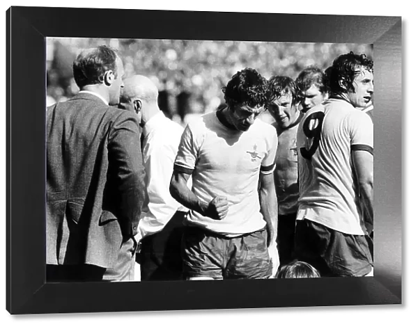 Frank Mclintock clenchs fist during the break in extra time which Arsenal went
