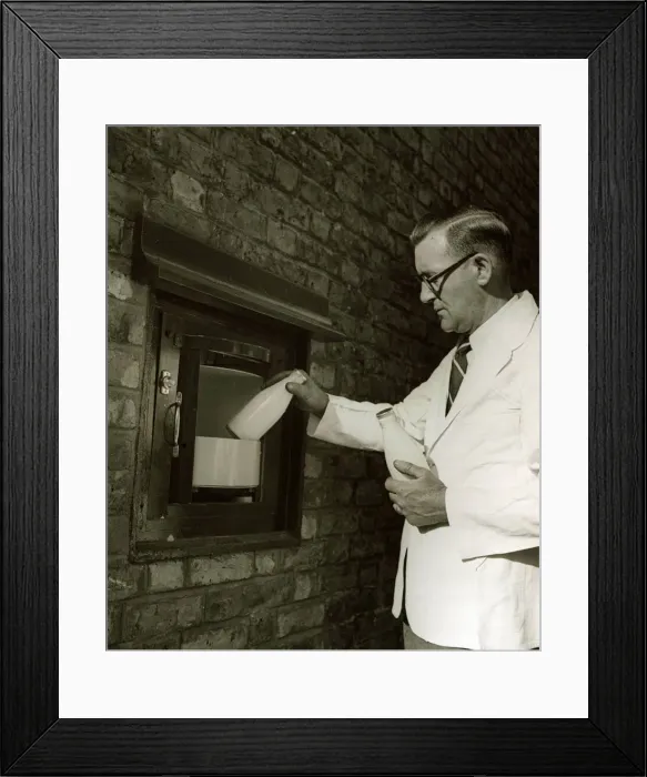 Framed Print : The Silent Butler - 1948 compartment built into structure to house milk delivery Framed Print : The Silent Butler - 1948 compartment built into structure to house milk delivery