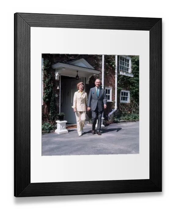 Framed Print : Johnn and Fanny Cradock outside their new home near Watford Framed Print : Johnn and Fanny Cradock outside their new home near Watford
