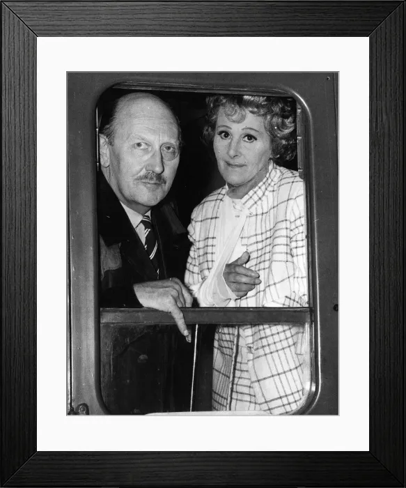 Framed Print : Fanny Cradock gourmet chef with husband John Cradock on train 1967