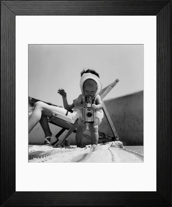 Framed Print : Susan May seen here with her mothers camera on Plymouth Hoe. Mother in deckchair
