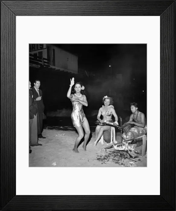 Framed Print : Felix Mendelssohn holds midnight beach party for Pulu Moe who has been with his band for