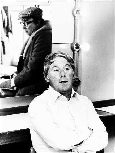 Comedian Ernie Wise sits in his dressing room with his comic partner Eric Morecambe