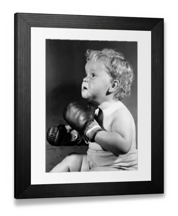 Framed Print : Children - Boxing baby, Paul Nute, of Chiswick wearing boxing gloves - The future Framed Print : Children - Boxing baby, Paul Nute, of Chiswick wearing boxing gloves - The future