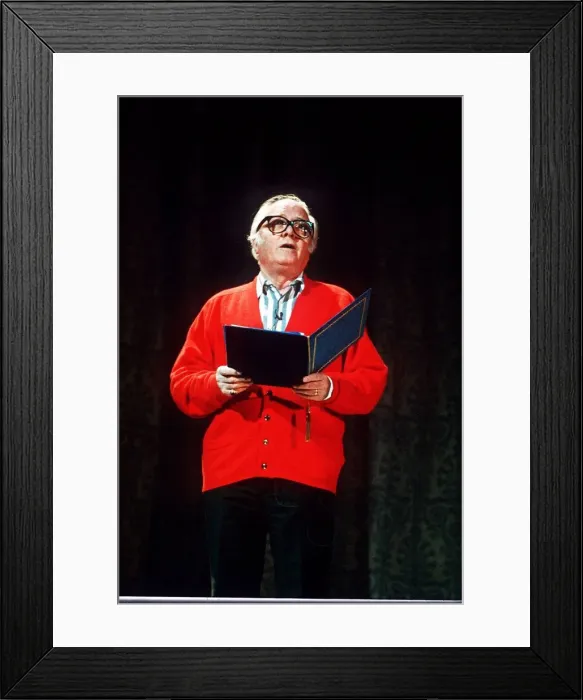 Framed Print : Richard Attenborough speaking wearing a red cardigan