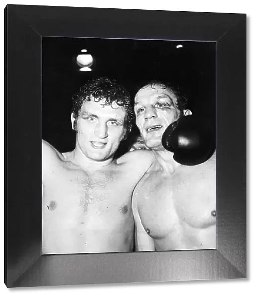 Joe Bugner boxer left and Henry Cooper who was beaten after 15 rounds on points alone