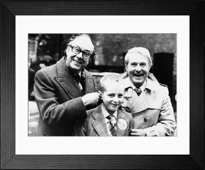 Framed Print : Morecambe And Wise with one of the winners of a children of courage award Framed Print : Morecambe And Wise with one of the winners of a children of courage award