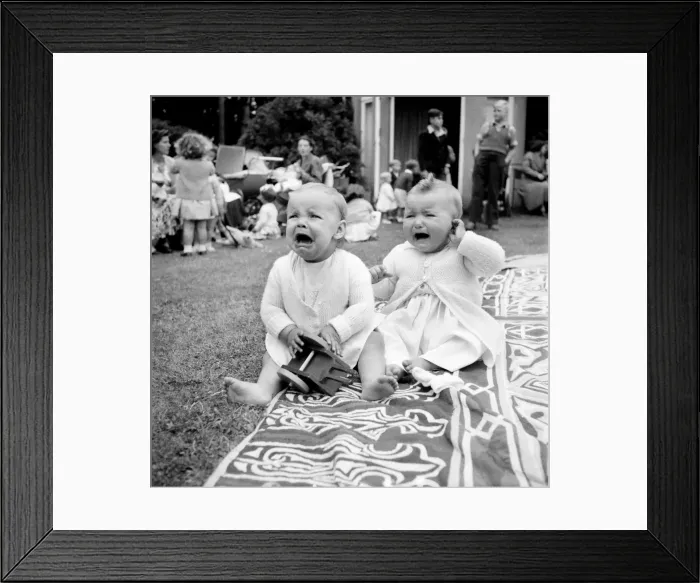 Framed Print : The unhappy couple Two small babies seen here crying at a London nursery June 1952 Framed Print : The unhappy couple Two small babies seen here crying at a London nursery June 1952