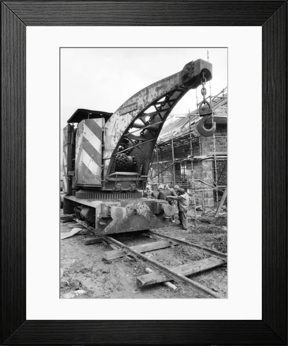 Framed Print : This 65 ton steam crame which was built in 1887 settles into its final resting place Framed Print : This 65 ton steam crame which was built in 1887 settles into its final resting place