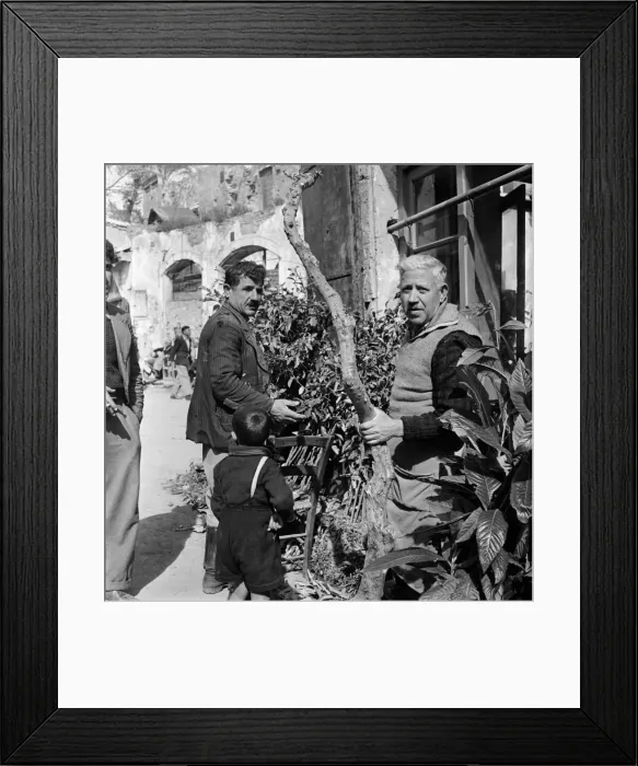 Framed Print : Elderly local men chatting on the street in a Cyprus town. March 1952 C1297-002
