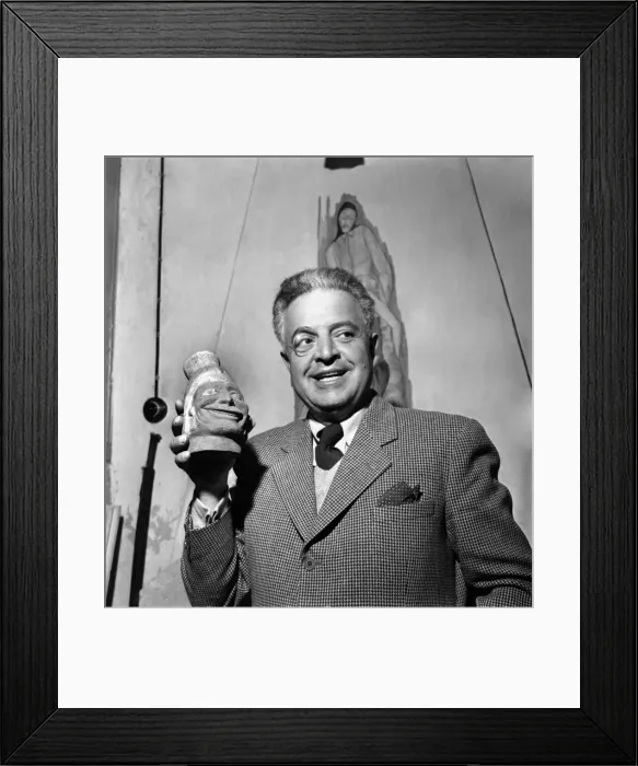 Framed Print : A man holding a local piece of artwork. March 1952 C1296-003 Framed Print : A man holding a local piece of artwork. March 1952 C1296-003