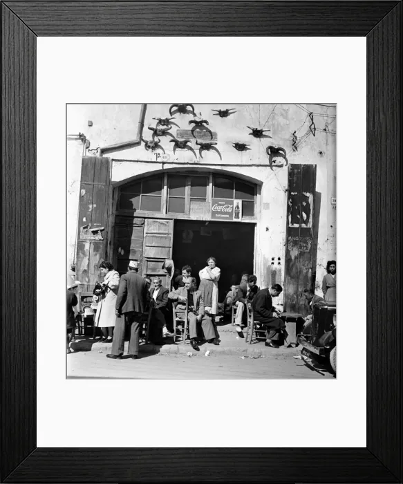 Framed Print : Locals sit about chatting in a Cypriot town. March 1952 C1297-005 Framed Print : Locals sit about chatting in a Cypriot town. March 1952 C1297-005