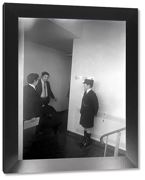 SDLP politician John Hume MP, being searched inside the county hall by police