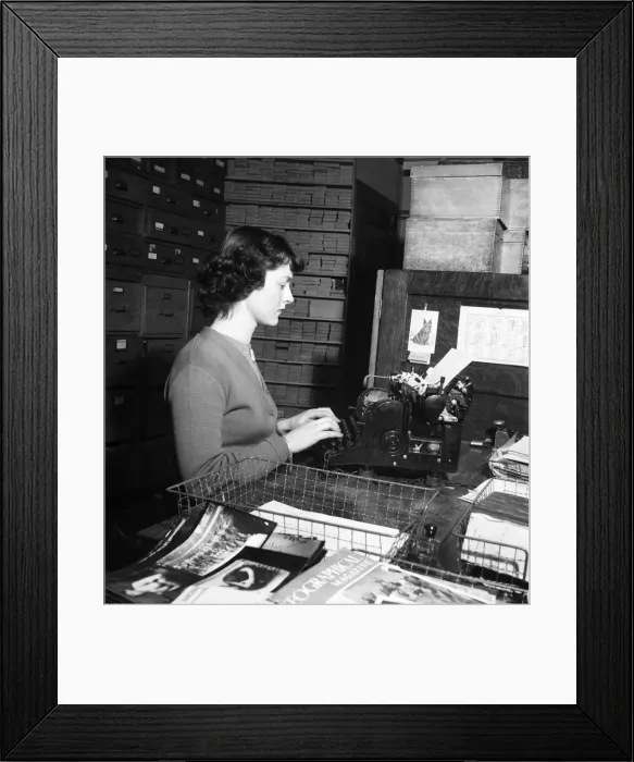 Framed Print : Typist at work. January 1951 B186 Framed Print : Typist at work. January 1951 B186
