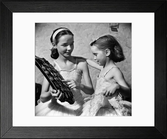 Framed Print : Anne Schofield, winner of 100 diplomas and 53 medals and cups shows Carol some of her Framed Print : Anne Schofield, winner of 100 diplomas and 53 medals and cups shows Carol some of her