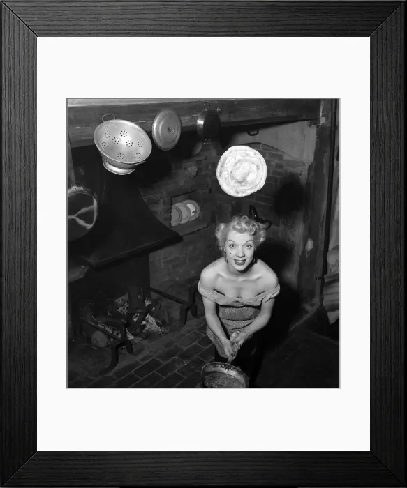Framed Print : Mrs Richard Heane tossing a pancake on Shrove Tuesday 1951. February 1951 B608 -001