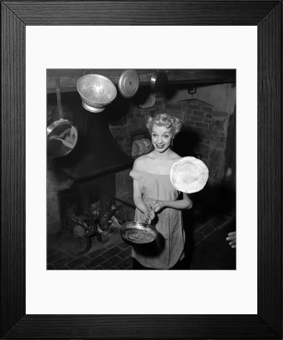 Framed Print : Mrs Richard Heane tossing a pancake on Shrove Tuesday 1951. February 1951 B608 -003