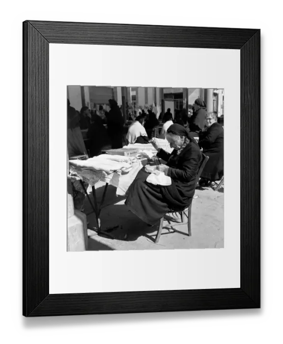 Framed Print : Old Greek Woman sewing at her stall waiting for customers in a Cyprus town March Framed Print : Old Greek Woman sewing at her stall waiting for customers in a Cyprus town March