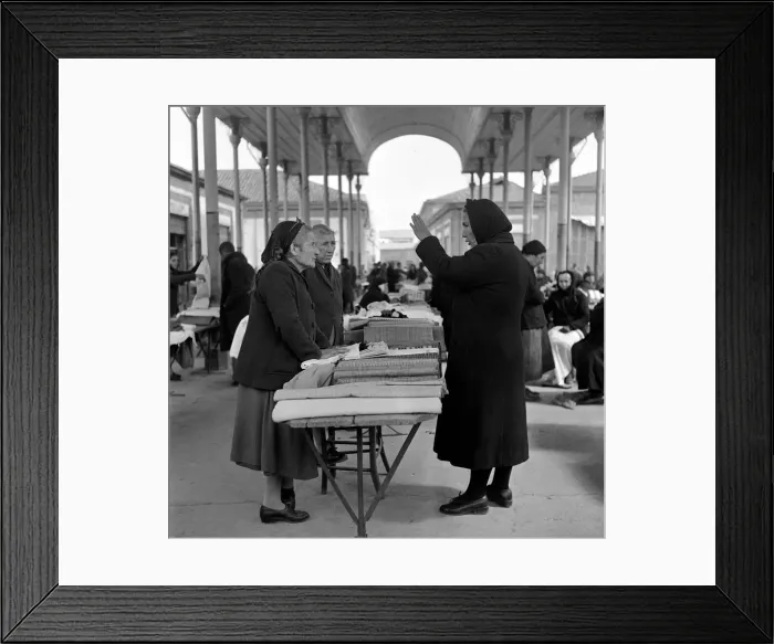 Framed Print : Old women bargaining for materials with vendors at a market in a Cyprus town Framed Print : Old women bargaining for materials with vendors at a market in a Cyprus town