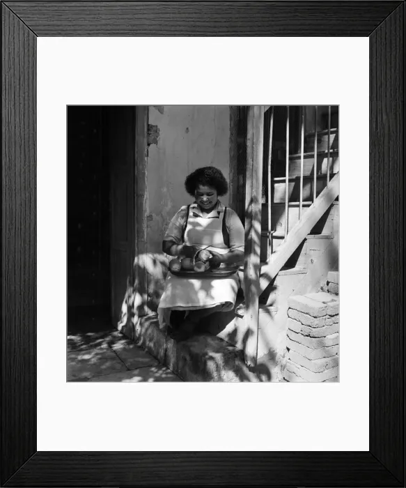 Framed Print : A local woman peeling oranges in a town in Cyprus. March 1952 C1296 Framed Print : A local woman peeling oranges in a town in Cyprus. March 1952 C1296