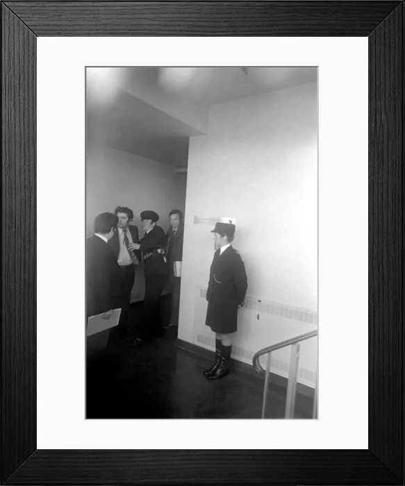 Framed Print : SDLP politician John Hume MP, being searched inside the county hall by police Framed Print : SDLP politician John Hume MP, being searched inside the county hall by police