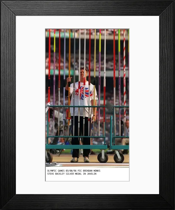 Framed Print : Steve Backley javelin thrower of Great Britain choosing his javelin before winning