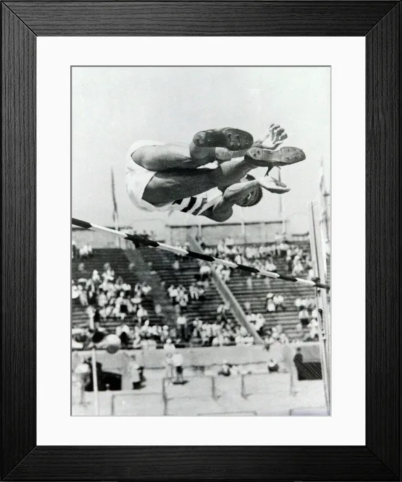 Framed Print : 1948 Olympic Games A competitor in the high jump at Wembley Stadium during Framed Print : 1948 Olympic Games A competitor in the high jump at Wembley Stadium during