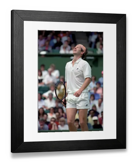 Framed Print : Wimbledon Tennis. Stefan Edberg beats John McEnroe who looks unhappy Framed Print : Wimbledon Tennis. Stefan Edberg beats John McEnroe who looks unhappy