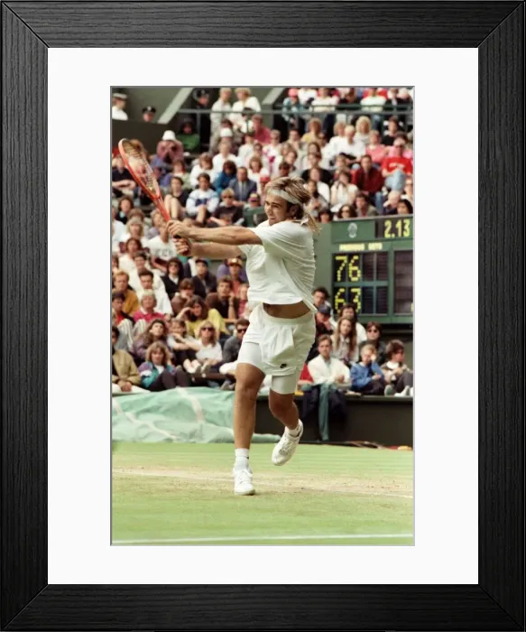 Framed Print : Wimbledon Tennis. Andre Agassi in action. July 1991 91-4178-059 Framed Print : Wimbledon Tennis. Andre Agassi in action. July 1991 91-4178-059