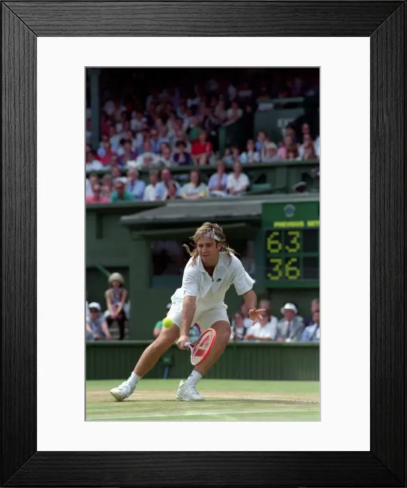 Framed Print : Wimbledon Tennis. Andre Agassi in action. July 1991 91-4218-024 Framed Print : Wimbledon Tennis. Andre Agassi in action. July 1991 91-4218-024