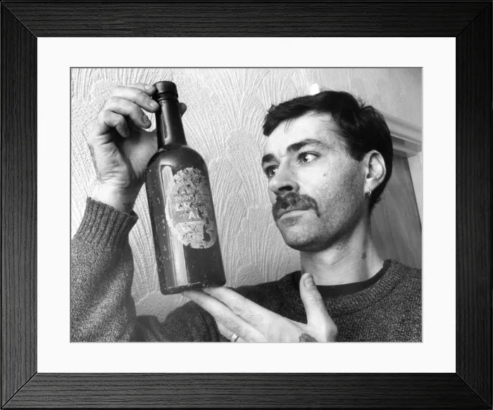 Framed Print : Edward Jelley with a Brown Ale bottle found in his allotment in Walker Framed Print : Edward Jelley with a Brown Ale bottle found in his allotment in Walker