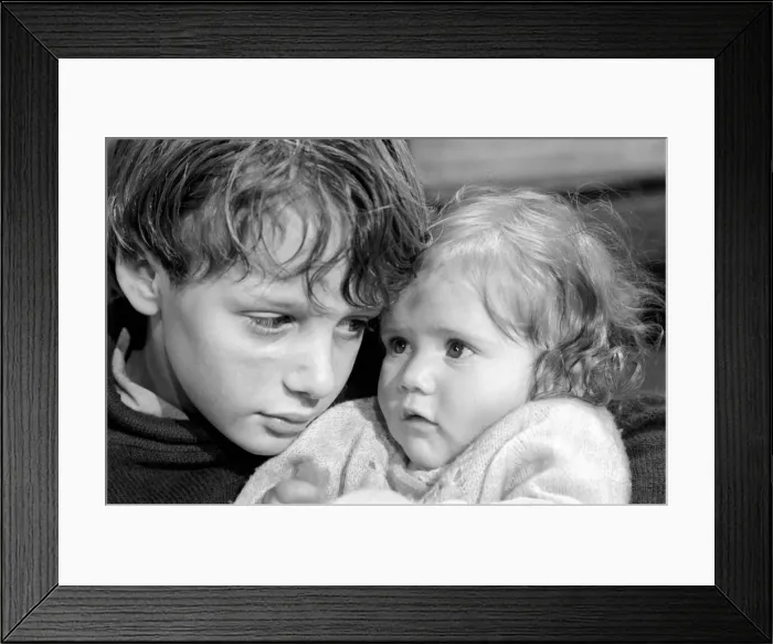 Framed Print : 12 year old Michael Reynolds and 8 month old Claire Lewis were stealing the limelight
