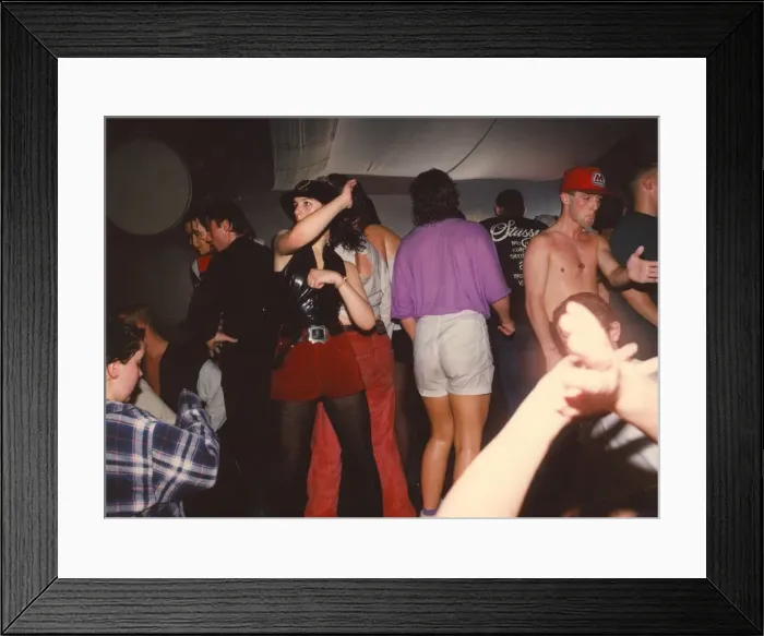 Framed Print : Clubbers get hot and sweaty enjoying a rave Framed Print : Clubbers get hot and sweaty enjoying a rave