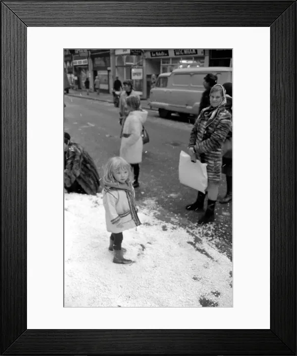 Framed Print : Festive Scenes. In South Molton street, Mayfair, it was snowing but it was only plastic Framed Print : Festive Scenes. In South Molton street, Mayfair, it was snowing but it was only plastic