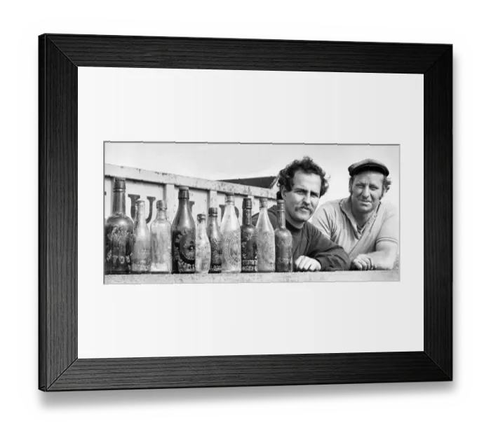 Framed Print : An excavator uncovered these old bottles from breweries all over the North East