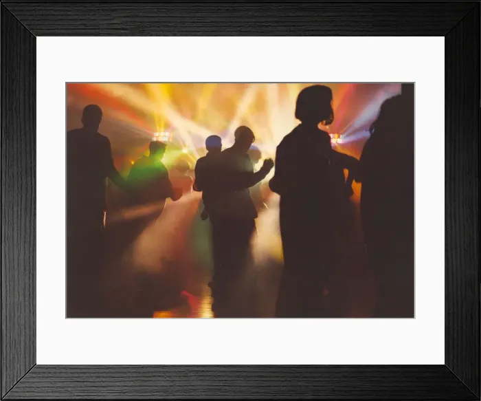 Framed Print : People enjoying dancing the night away at a rave Framed Print : People enjoying dancing the night away at a rave