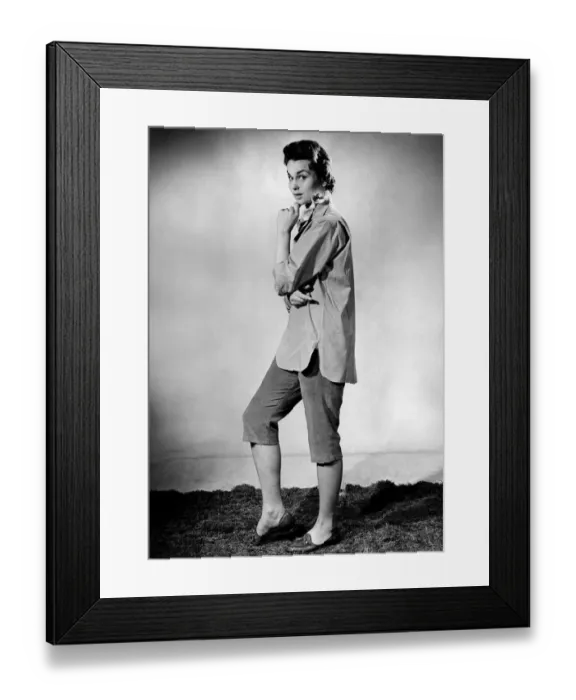 Framed Print : Woman wearing three quarter length trousers and loose fitting shirt Framed Print : Woman wearing three quarter length trousers and loose fitting shirt