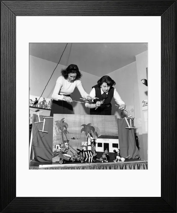 Framed Print : Baley and mother puppet show. March 1953 D106 Framed Print : Baley and mother puppet show. March 1953 D106